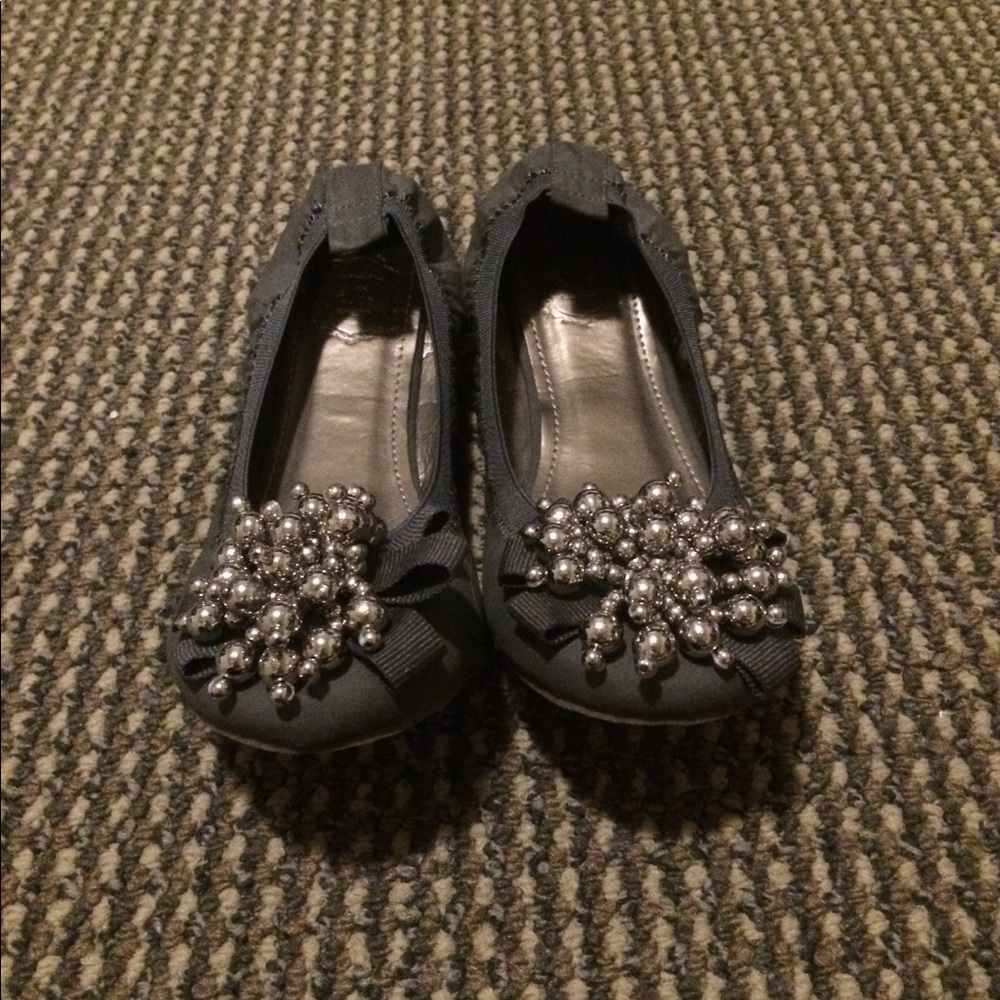 Gray Flats with Silver Embellishments.